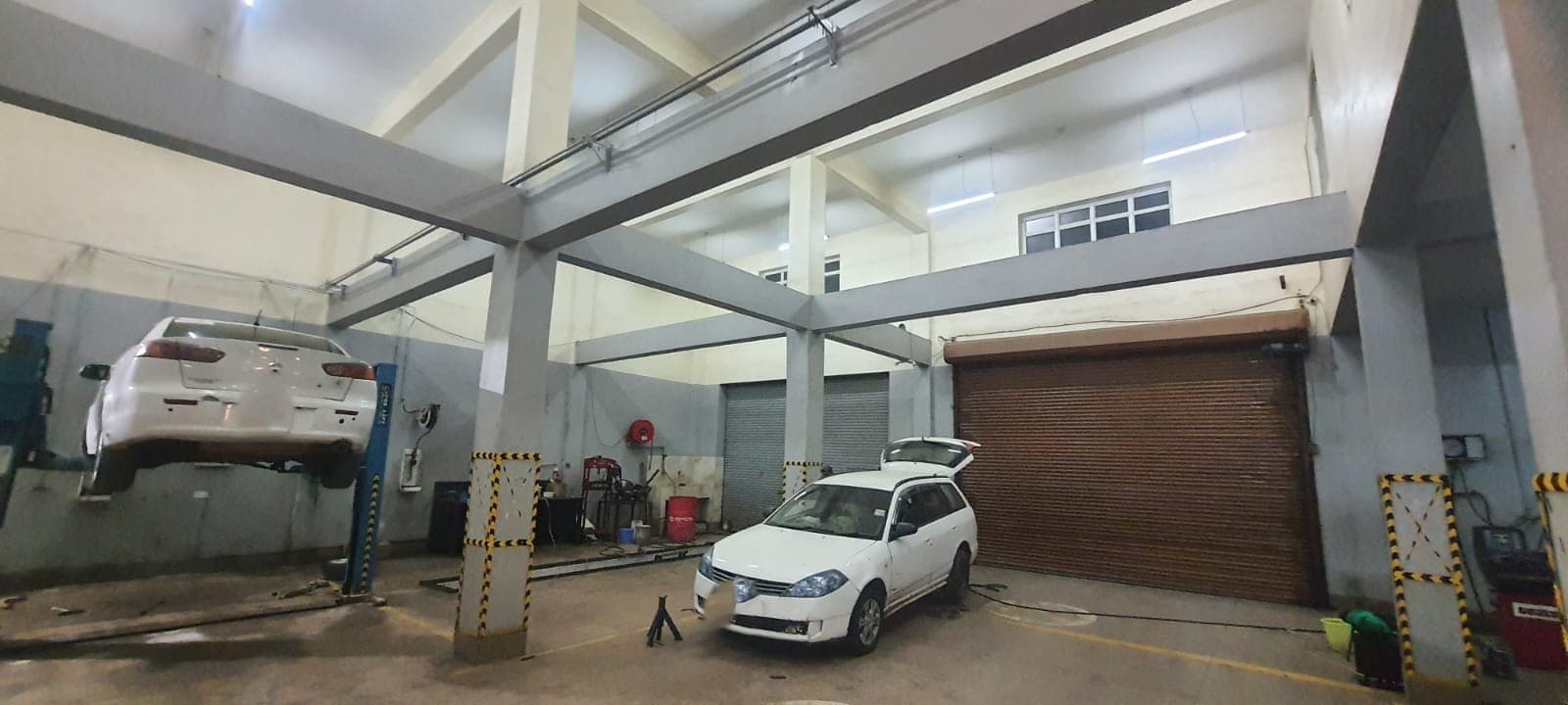 Customer vehicles parked overnight in the secure, well-lit Parkside Garage bay